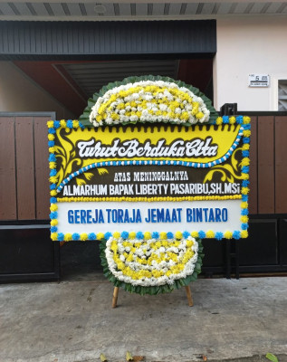 Papan Bunga Duka di Yamoneri